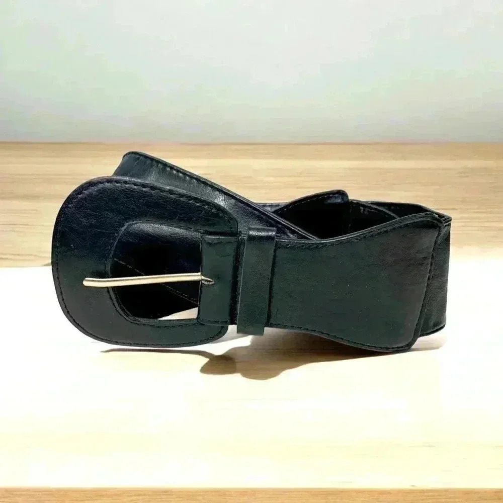 Soft, black vegan leather waist belt, silver hardware, padded buckle